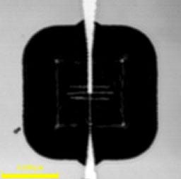 Figure 9. Laser scanning image of a wire-bonded ACNTC taken with the OLS5000 microscope’s long-working-distance lens (LMPLFLN100xLEXT). The long working distance enables imaging of devices in a chip carrier without removing and destroying the sample.