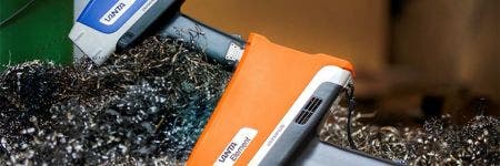 What Does an XRF Analyzer Cost? Vanta XRF gun for measuring scrap metal in recycling plant.