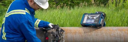 Steel pipe weld inspector using the OmniScan X3 phased array ultrasonic testing instrument and AxSEAM long seam scanner for longitudinal scanning