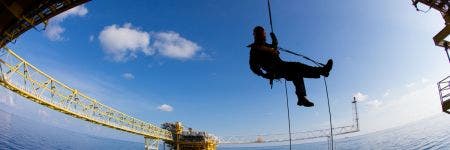 Rope access job on an offshore oil rig platform