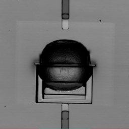 Figure 2. (a) A laser-scanning image shows the damaged cavity caused by the FIB. (b) An undamaged cavity. The OLS5000 microscope is nondestructive; cavities can be imaged at any point during the process flow of the device.