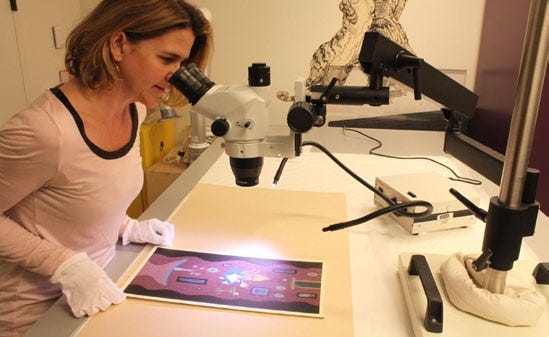 The Walt Disney Family Museum Objects Conservator Tonja Morris uses the Olympus SZ61 stereo microscope to examine Alice falling down the rabbit hole, conceptual artwork by renowned Disney artist Mary Blair. (Photo courtesy of The Walt Disney Family Museum. All Disney characters copyrighted by Disney.)